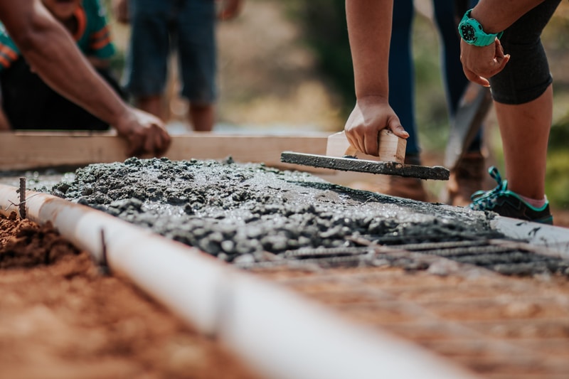 Workers working with cement