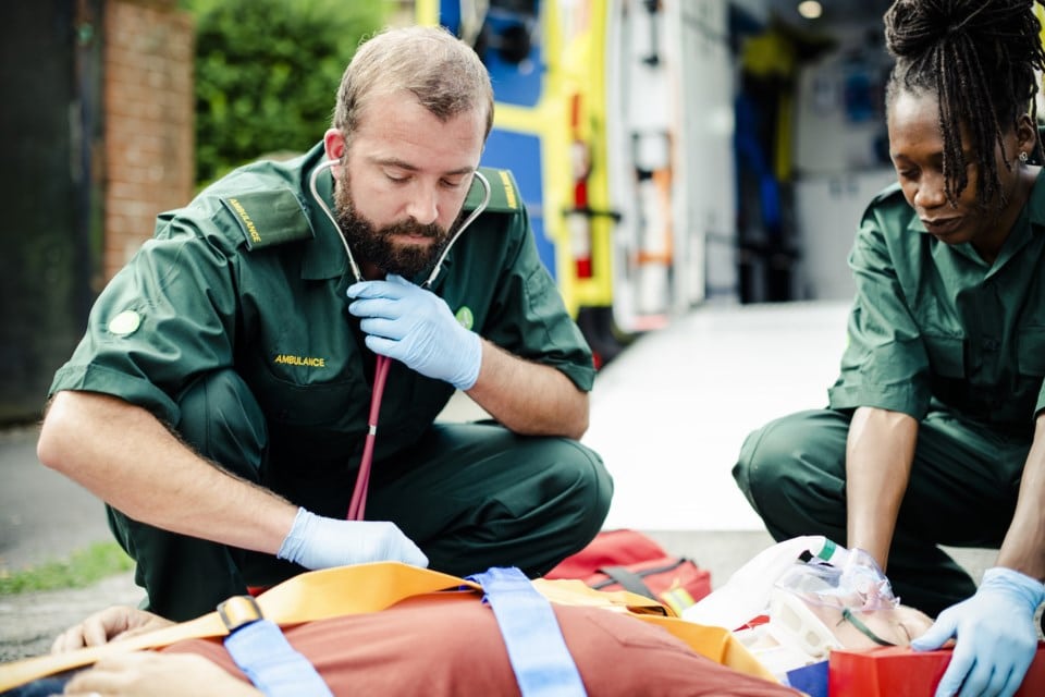 EMTS aiding an accident victim