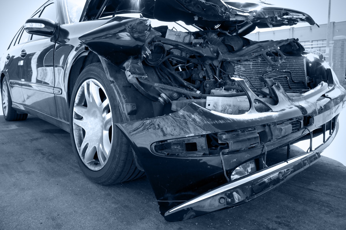 damaged front end of vehicle after Portland car crash
