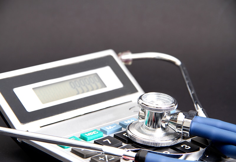 calculator and stethoscope