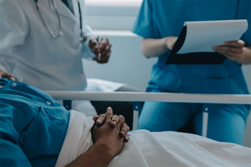 doctor and nurse with patient injured in a car crash