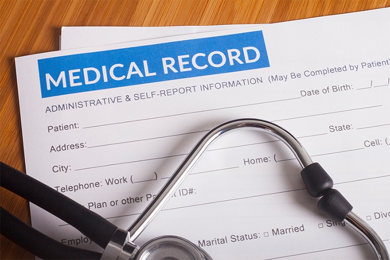 medical records and stethoscope
