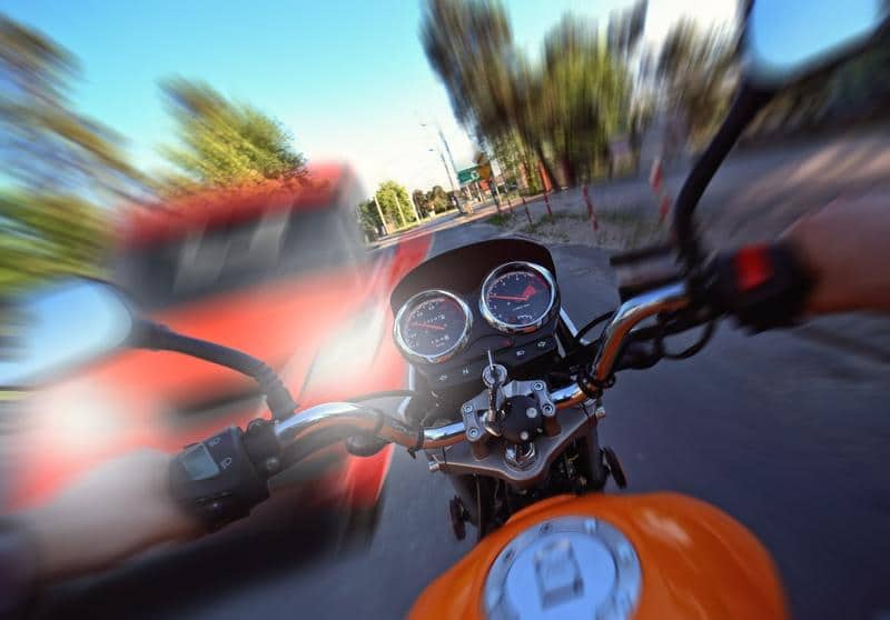 POV of driver orange motorcycle