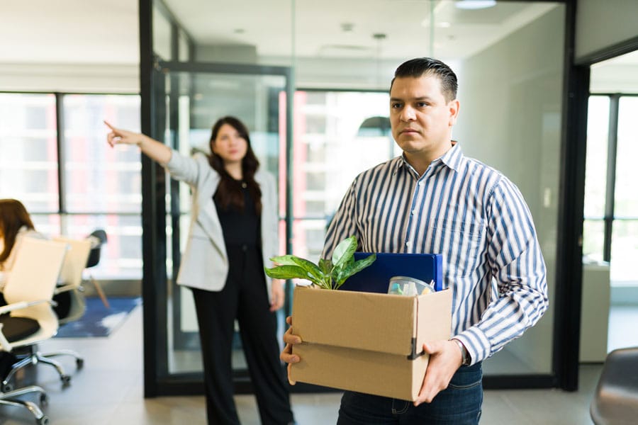 Image depicting an employee being fired.