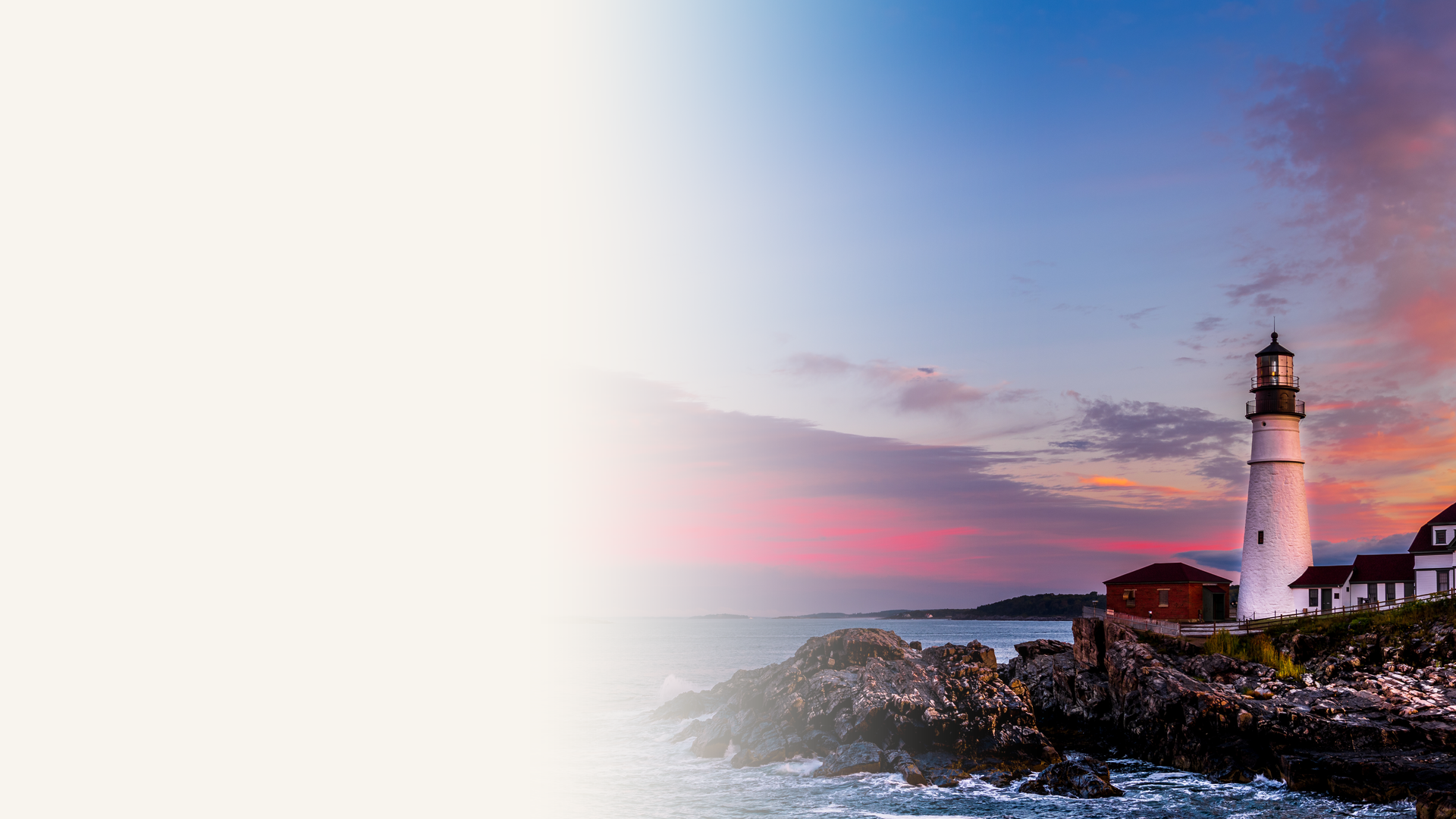 Portland Head Light lighthouse on the rocky coast of Cape Elizabeth near Portland, Maine at sunset