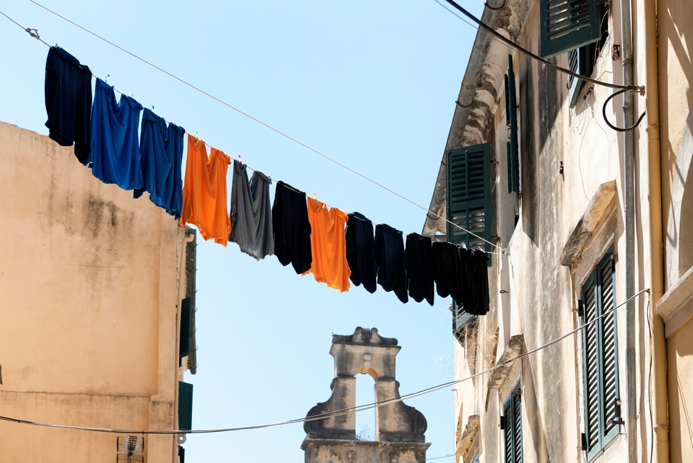 clothing hanging to dry in city