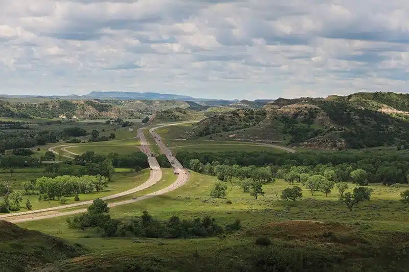 Interstate 94 traffic in North Dakota, a divided interstate that carries heavy volume but has a lower fatality rate per mile than rural two-lane highways