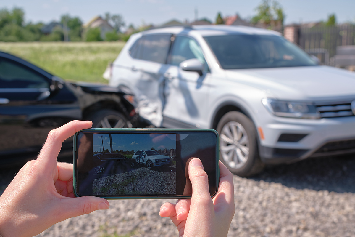 Taking photo of car accident