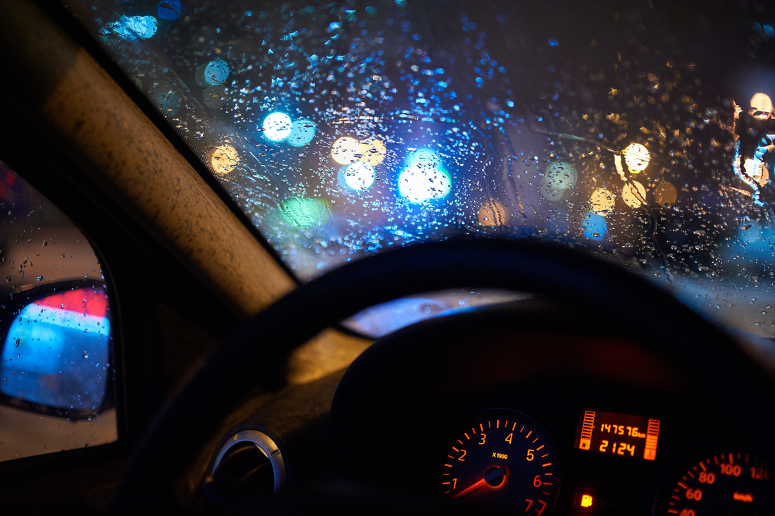 car driving in mad weather at night