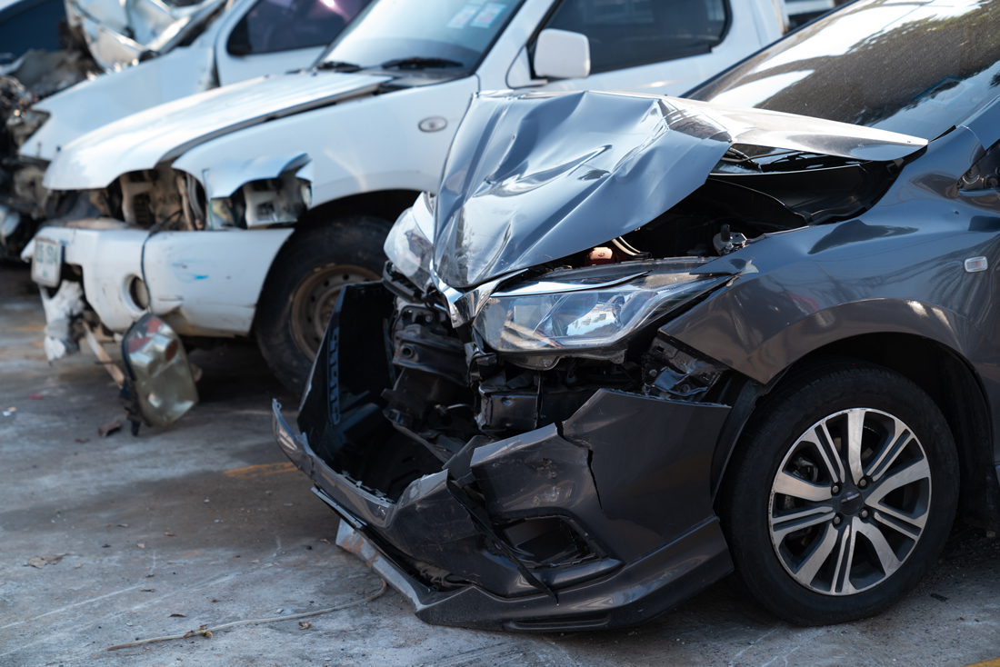 three vehicles with front end damage