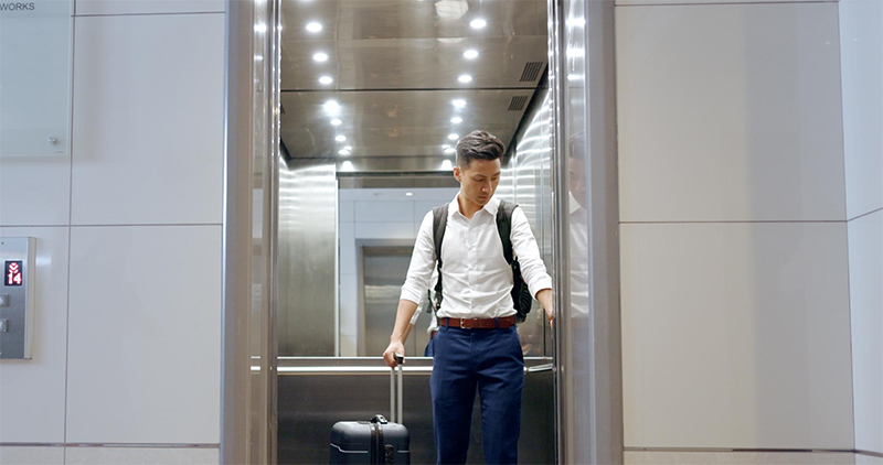 man entering elevator