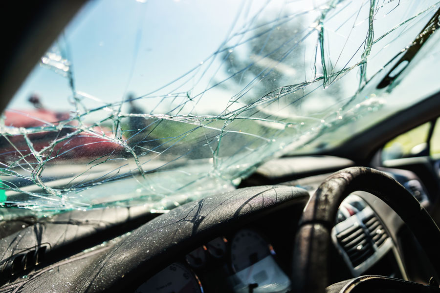 Shattered windshield in car